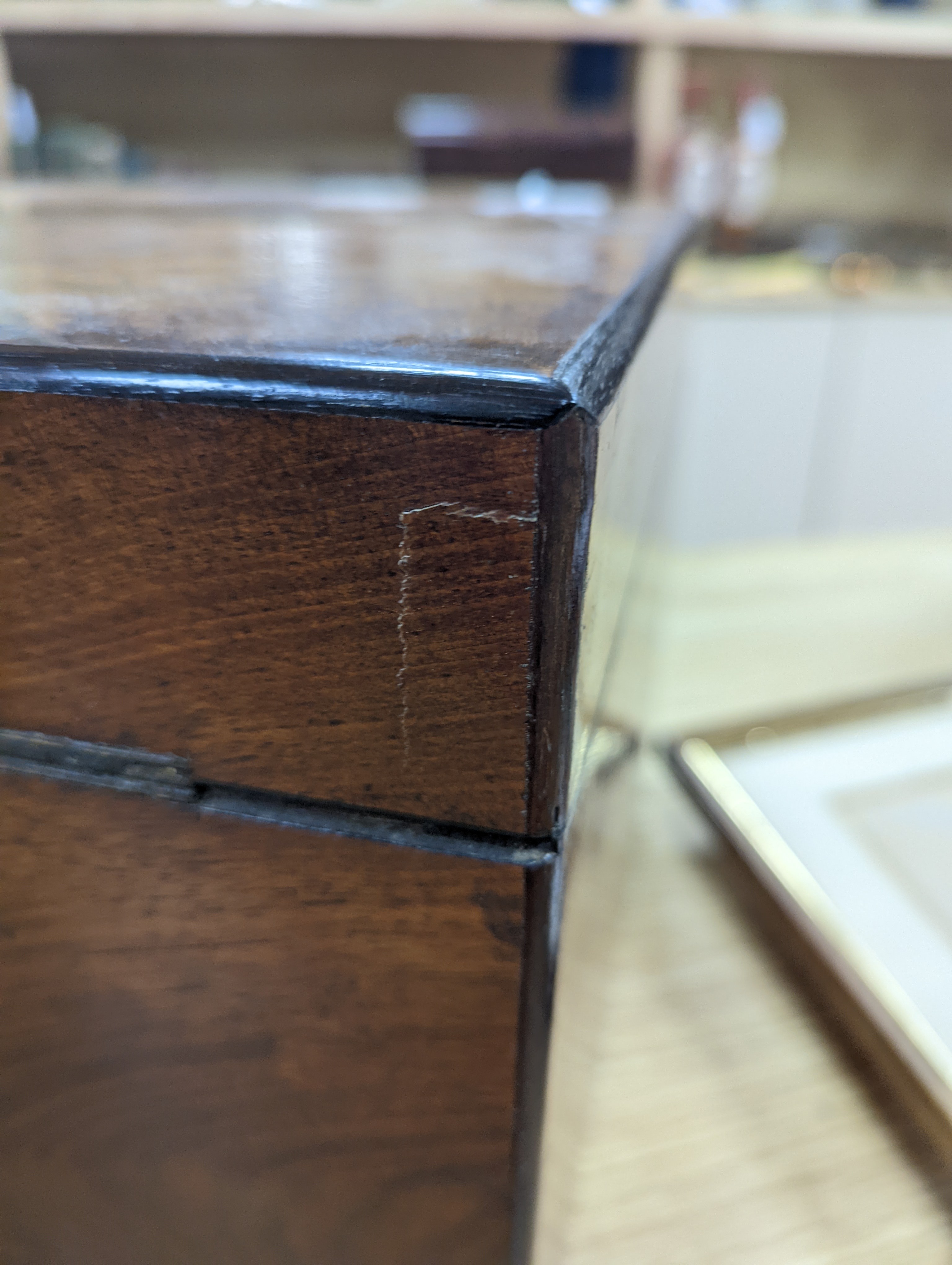 A Victorian walnut sewing casket, 34cm, containing sewing related accessories
